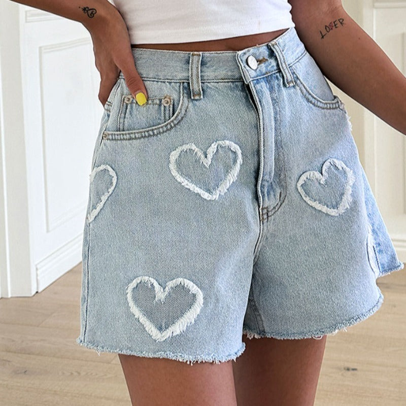 Pantaloncini in jeans con cucitura cuore