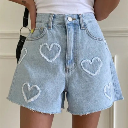 Pantaloncini in jeans con cucitura cuore